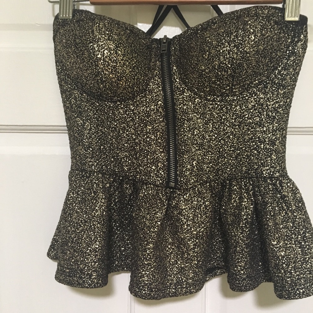 Sparkly gold and black peplum top